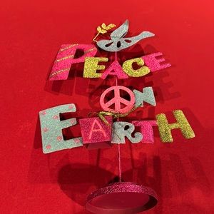 Peace on earth Christmas statue.